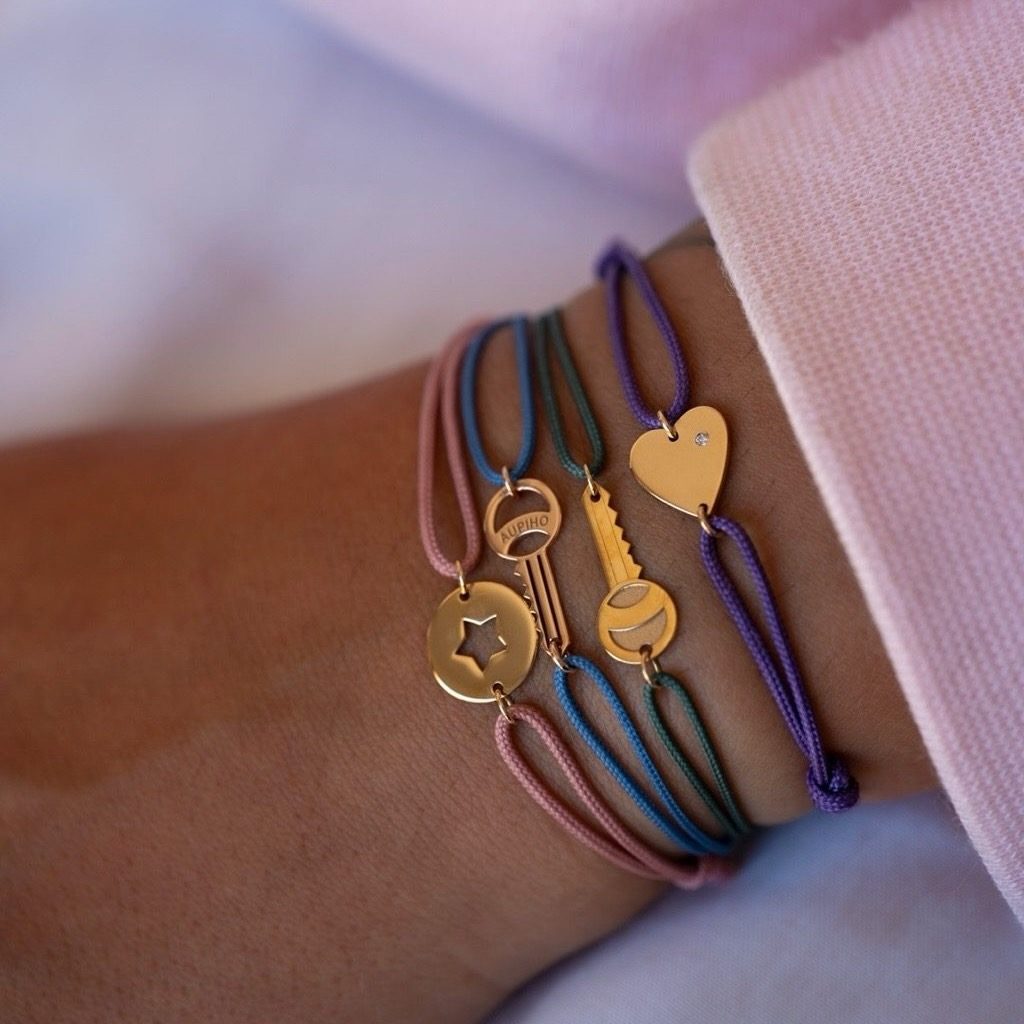 Bijoux porte-bonheur : la clé, l’étoile, cœur, le fer à cheval, symboles de chance et d'espoir